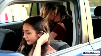 Driver watch girls make out in backseat